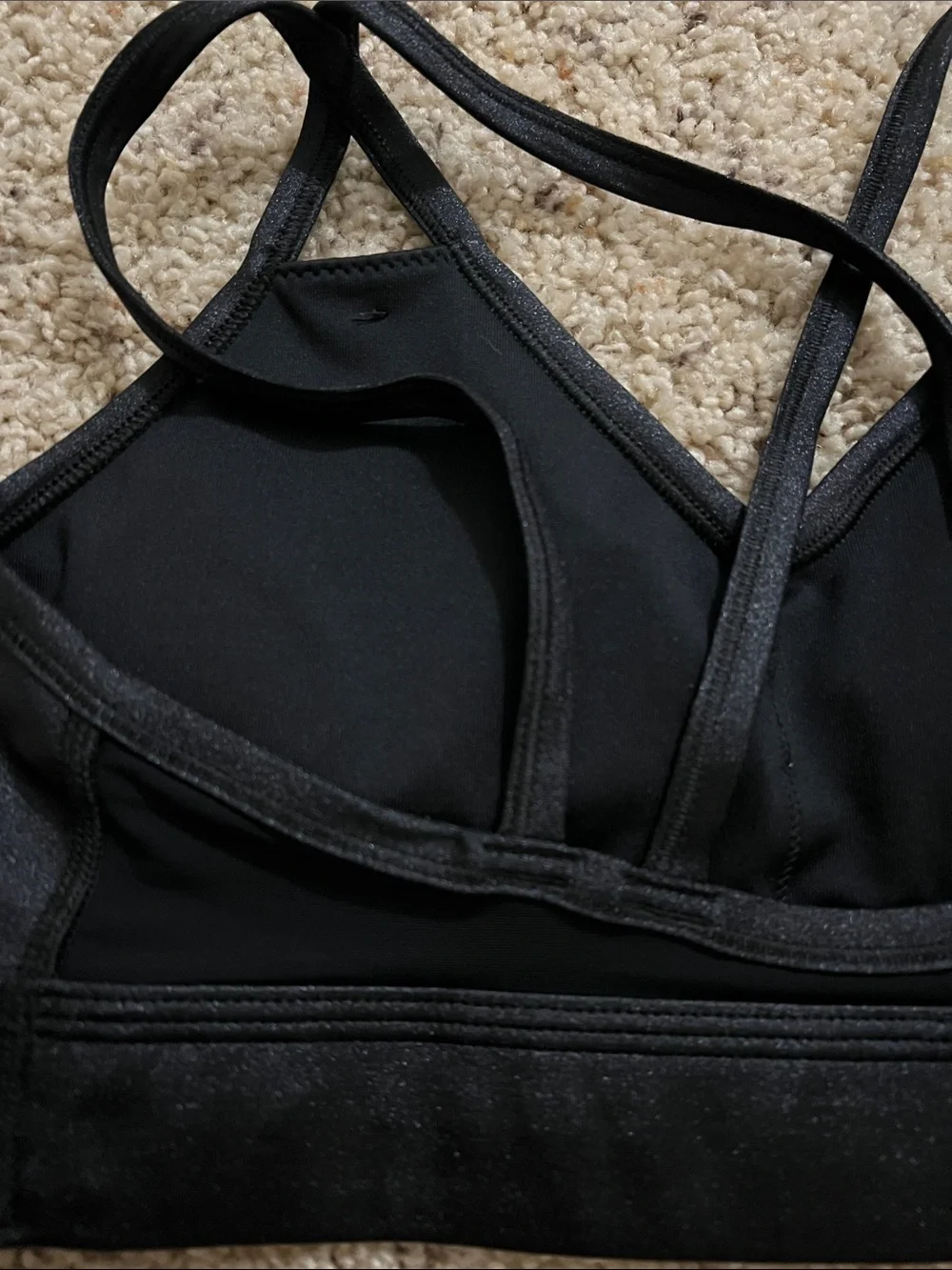 Nike Black Strappy V‑Neck Sports Bra with White Swoosh